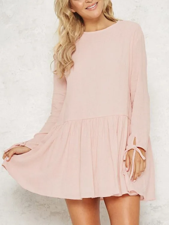 Wholesale Pink Round Neck Long Sleeve Lace-Up Ruffle Hem Mini Dress